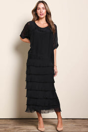 Model Maddiec wearing size 10 of the Silk Blend Multi Layers Dress - Black in colour Black, from the front