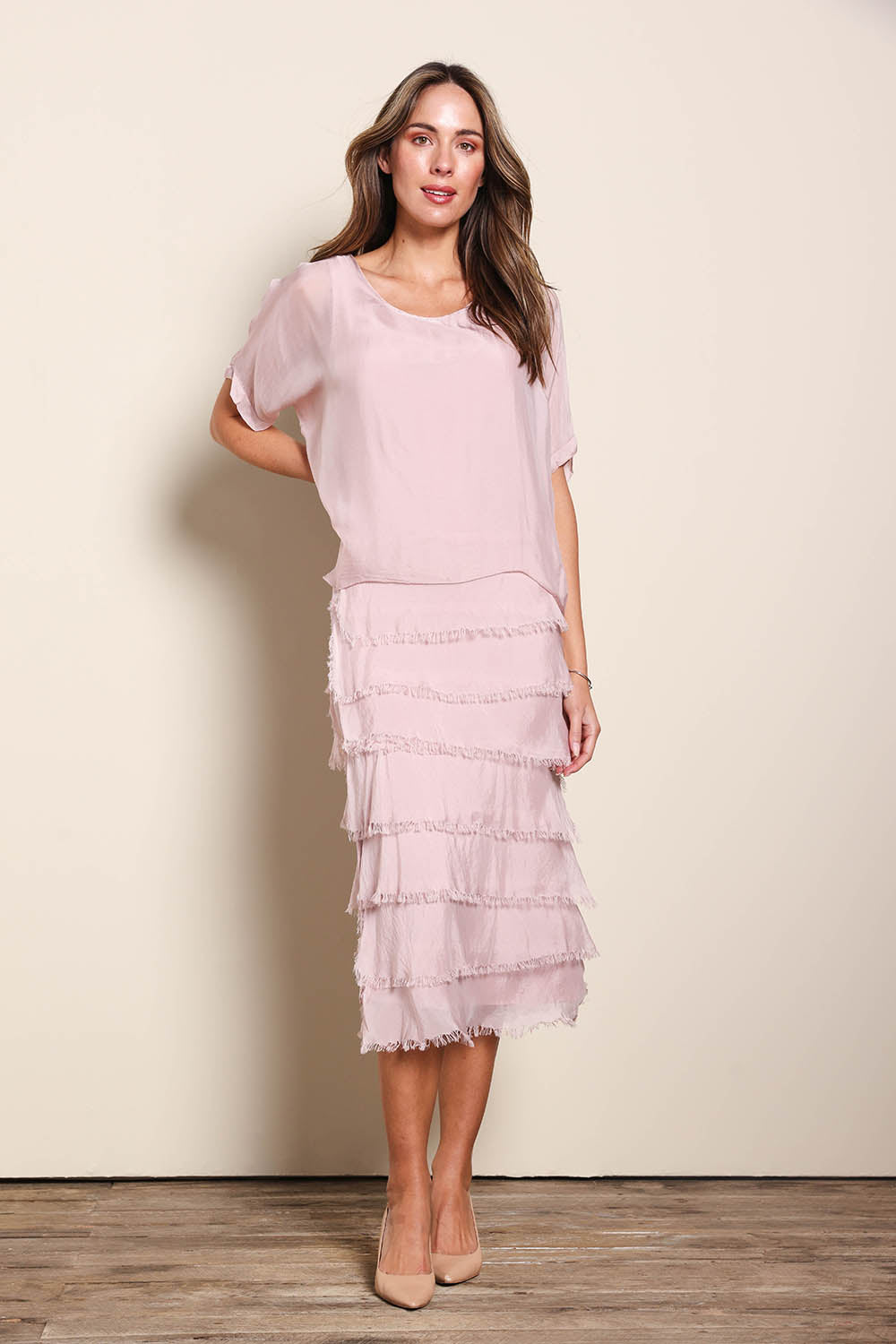 Model Maddiec wearing size 10 of the Silk Blend Multi Layers Dress - Blush in colour Blush, from the front