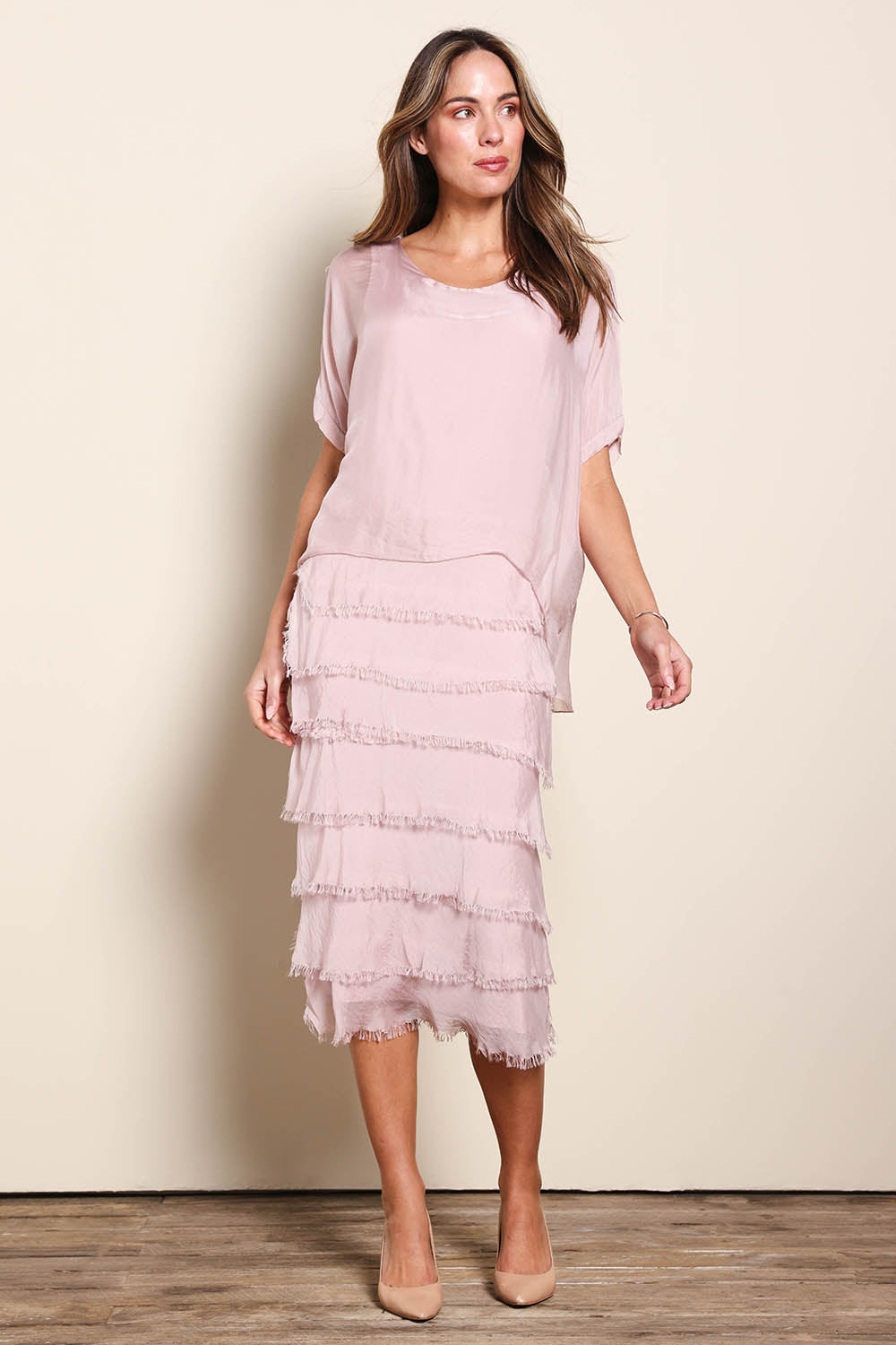 Model Maddiec wearing size 10 of the Silk Blend Multi Layers Dress - Blush in colour Blush, from the front