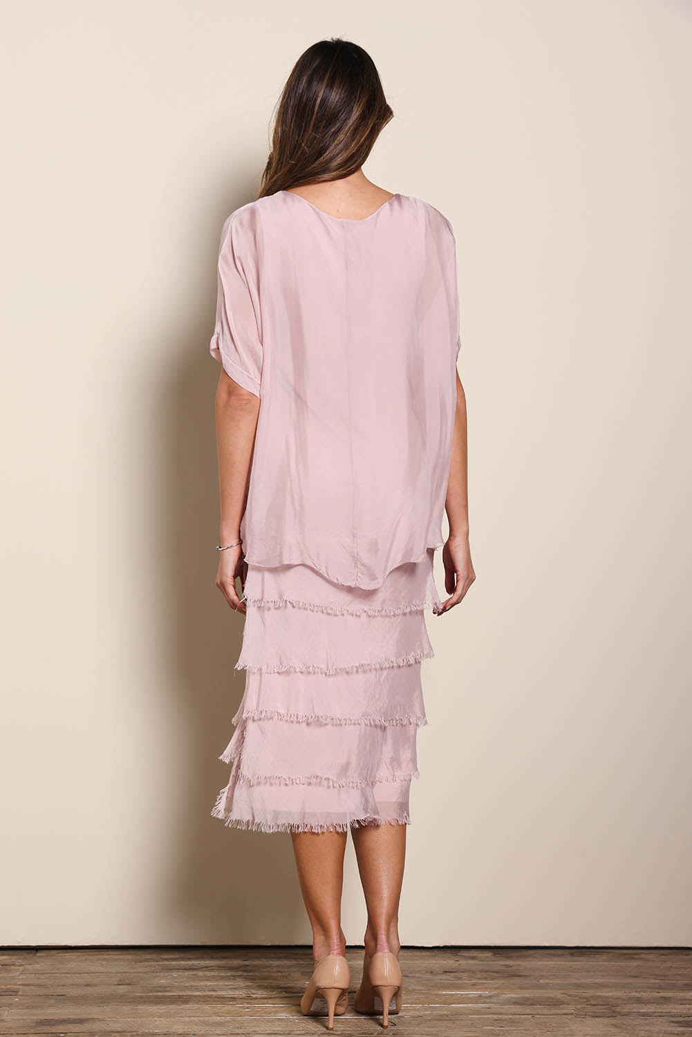 Model Maddiec wearing size 10 of the Silk Blend Multi Layers Dress - Blush in colour Blush, from the front