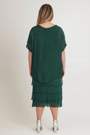 Model Chanel wearing the Silk Blend Multi Layers Dress in colour Darkgreen (Green), from the back