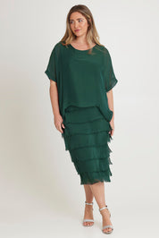 Model Chanel wearing the Silk Blend Multi Layers Dress in colour Darkgreen (Green), from the front, showing the whole outfit