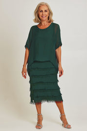 Model Sandy wearing the Silk Blend Multi Layers Dress in colour Darkgreen (Green), from the front, showing the whole outfit