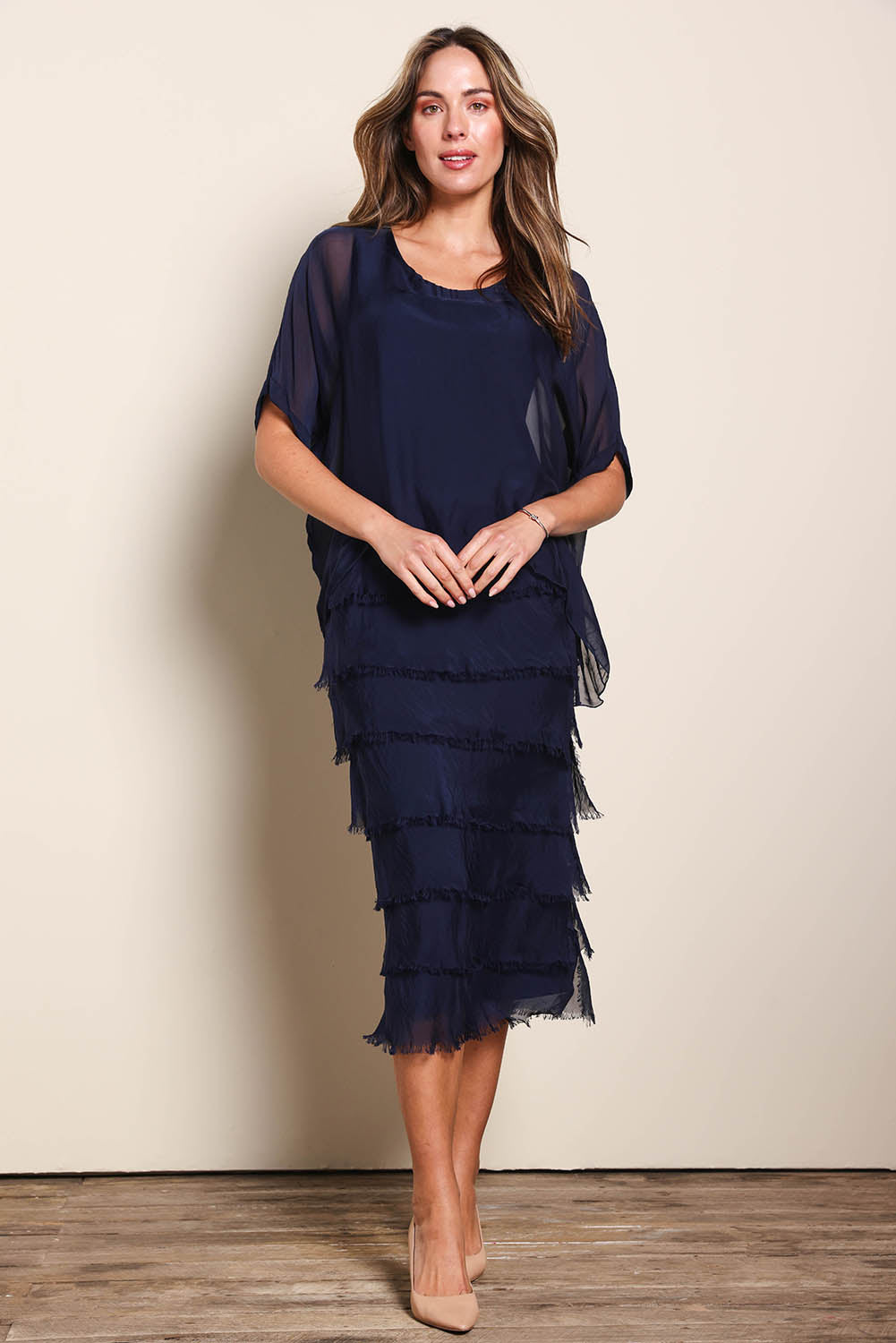 Model Maddiec wearing size 10 of the Silk Blend Multi Layers Dress - Navy in colour Navy, from the front