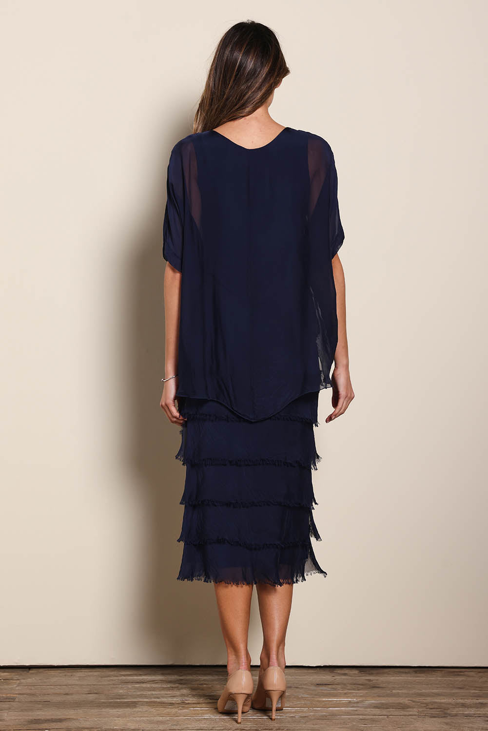 Model Maddiec wearing size 10 of the Silk Blend Multi Layers Dress - Navy in colour Navy, from the front