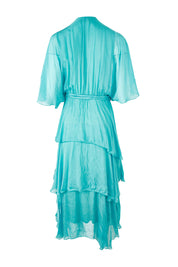 Product shot of the Short Sleeve Silk Dress in colour Aqua (Green), from the back