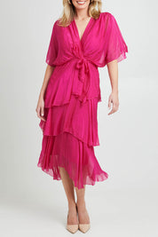 Model Grace wearing the Short Sleeve Silk Dress in colour Raspberry (Pink), from the front, cropped image