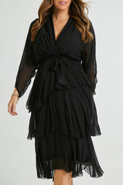 Model Laura wearing the Long Sleeve Silk Dress in colour Black (Black), from the front, cropped image