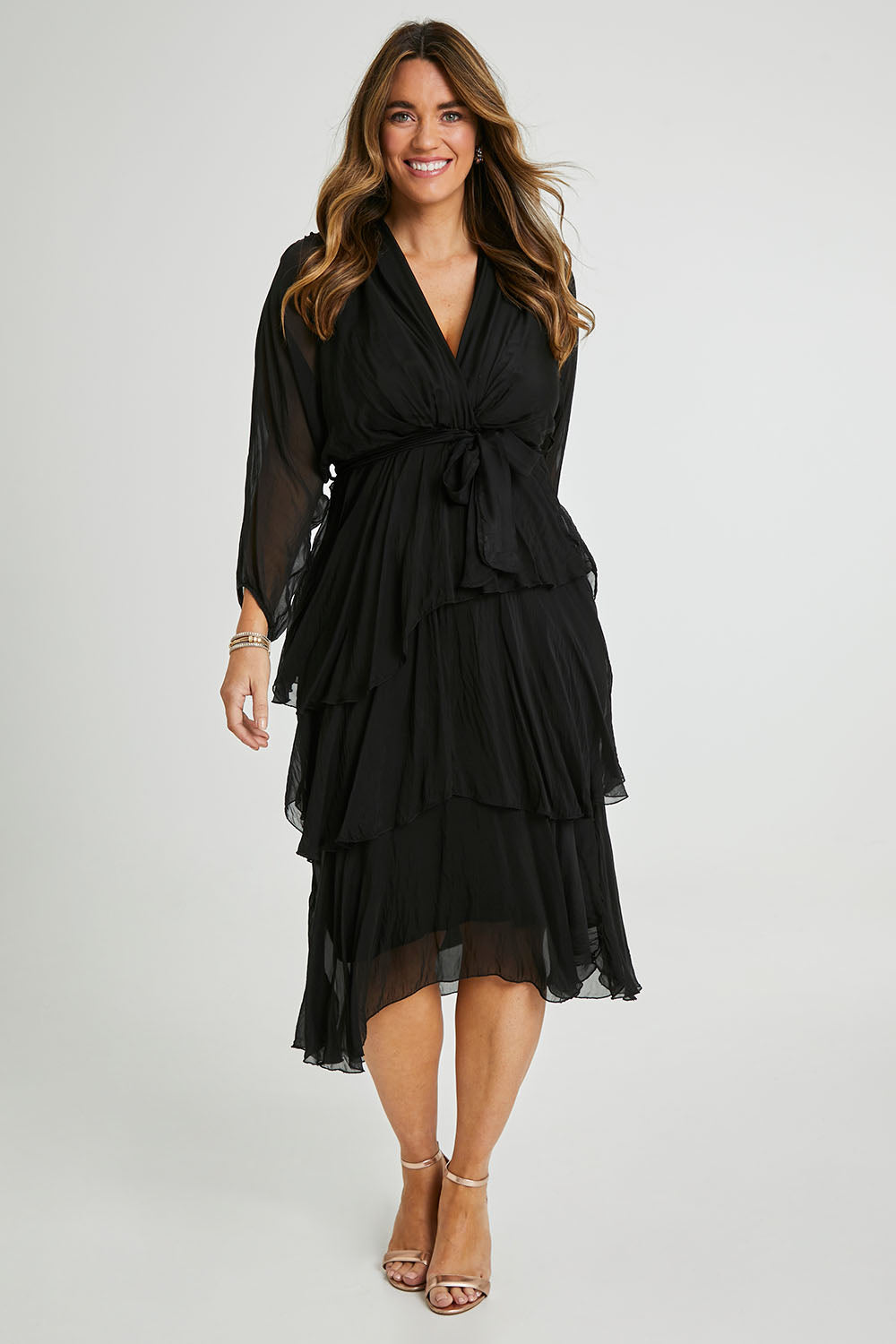 Model Laura wearing the Long Sleeve Silk Dress in colour Black (Black), from the front, showing the whole outfit