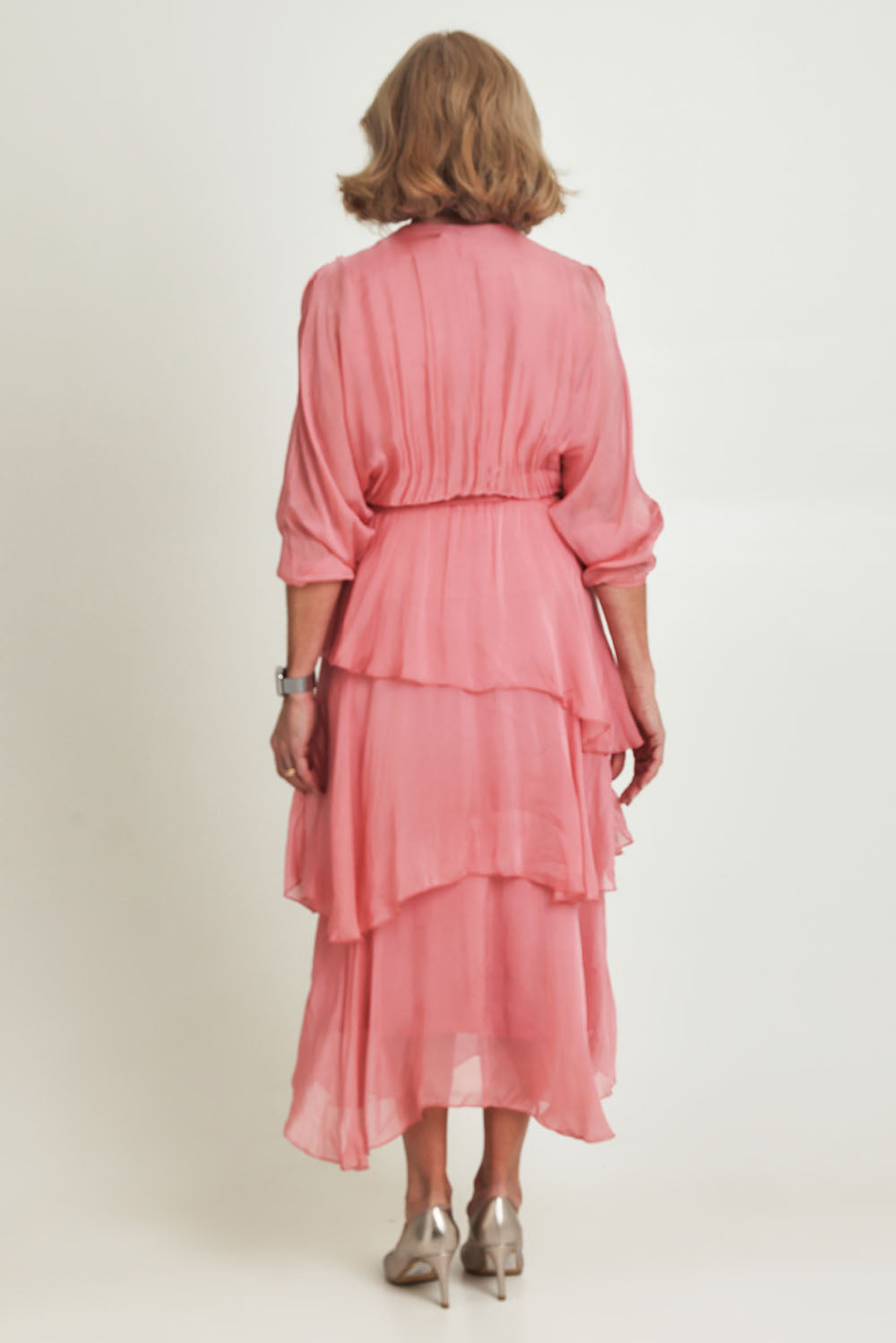 Model Sandy wearing the Long Sleeve Silk Dress in colour Darkpink (Pink), from the back