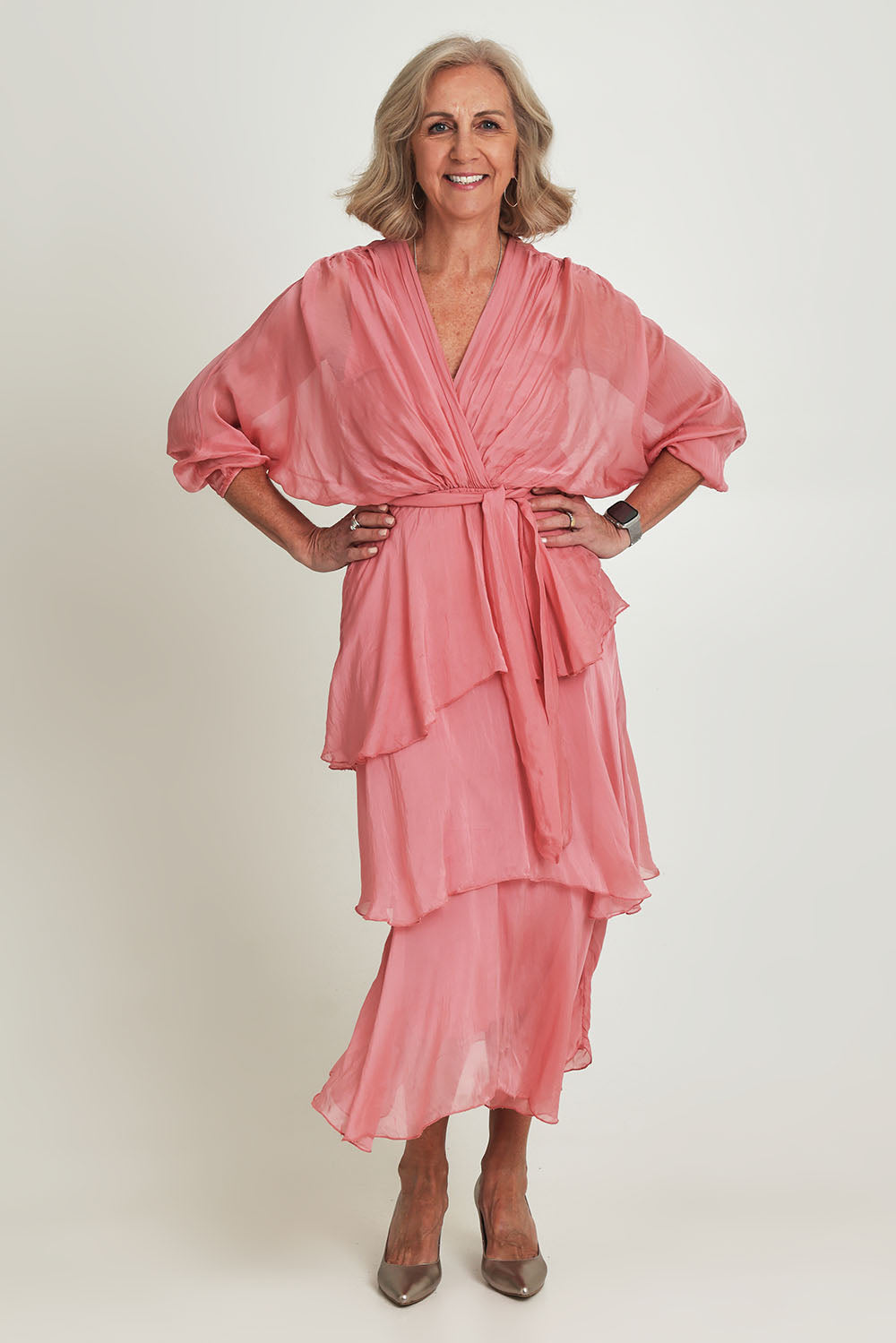 Model Sandy wearing the Long Sleeve Silk Dress in colour Darkpink (Pink), from the front, showing the whole outfit