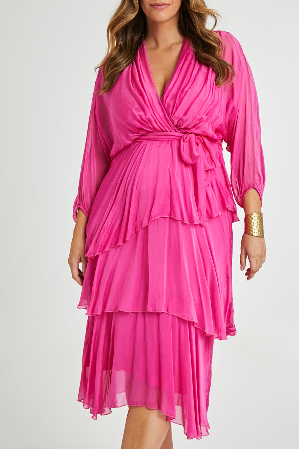 Model Laura wearing the Long Sleeve Silk Dress in colour Raspberry (Pink), from the front, cropped image