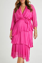 Model Laura wearing the Long Sleeve Silk Dress in colour Raspberry (Pink), from the front, cropped image
