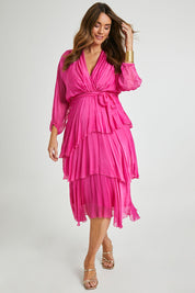 Model Laura wearing the Long Sleeve Silk Dress in colour Raspberry (Pink), from the front, showing the whole outfit