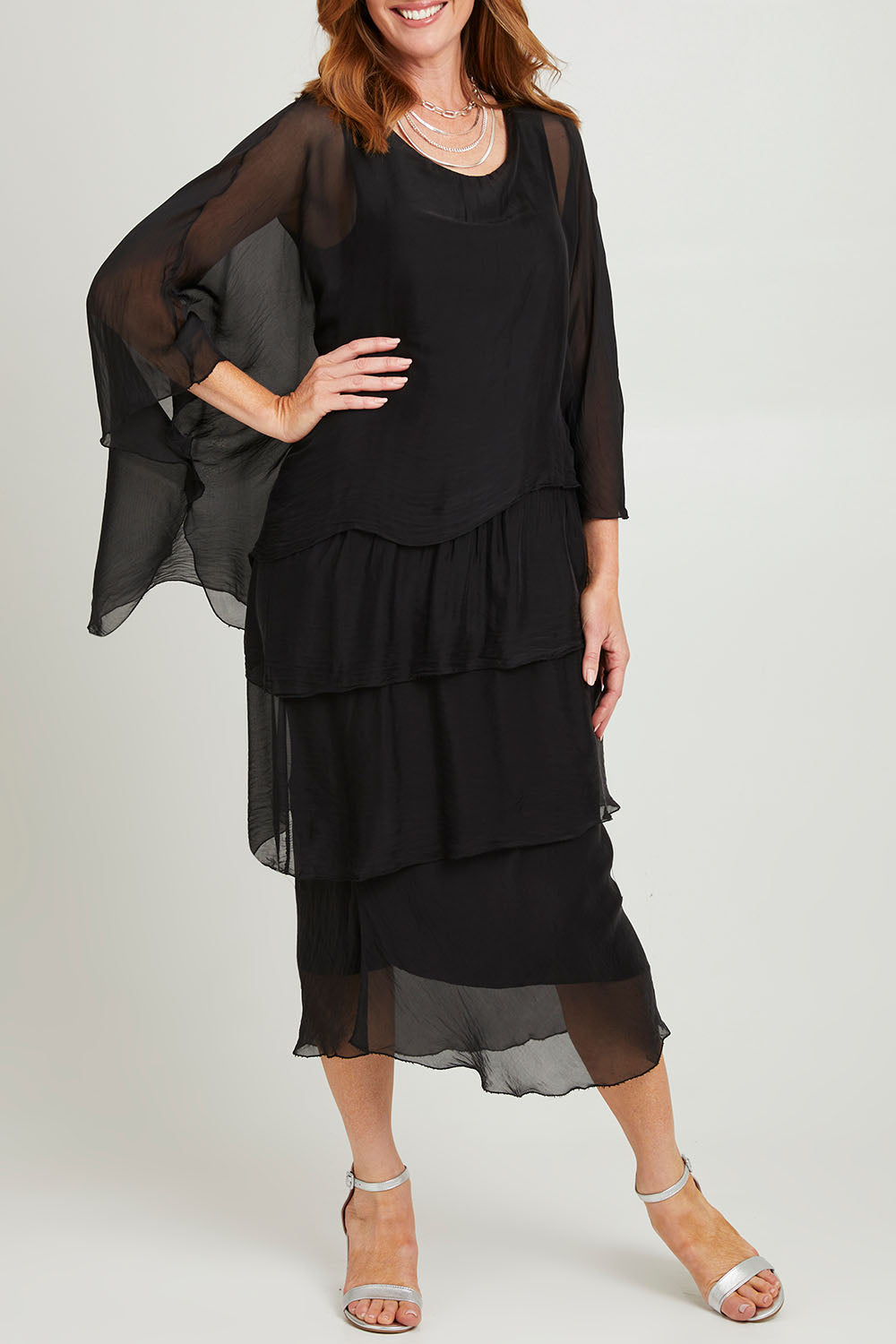 Model Katie wearing the Overlay Silk Dress in colour Black (Black), from the front, cropped image