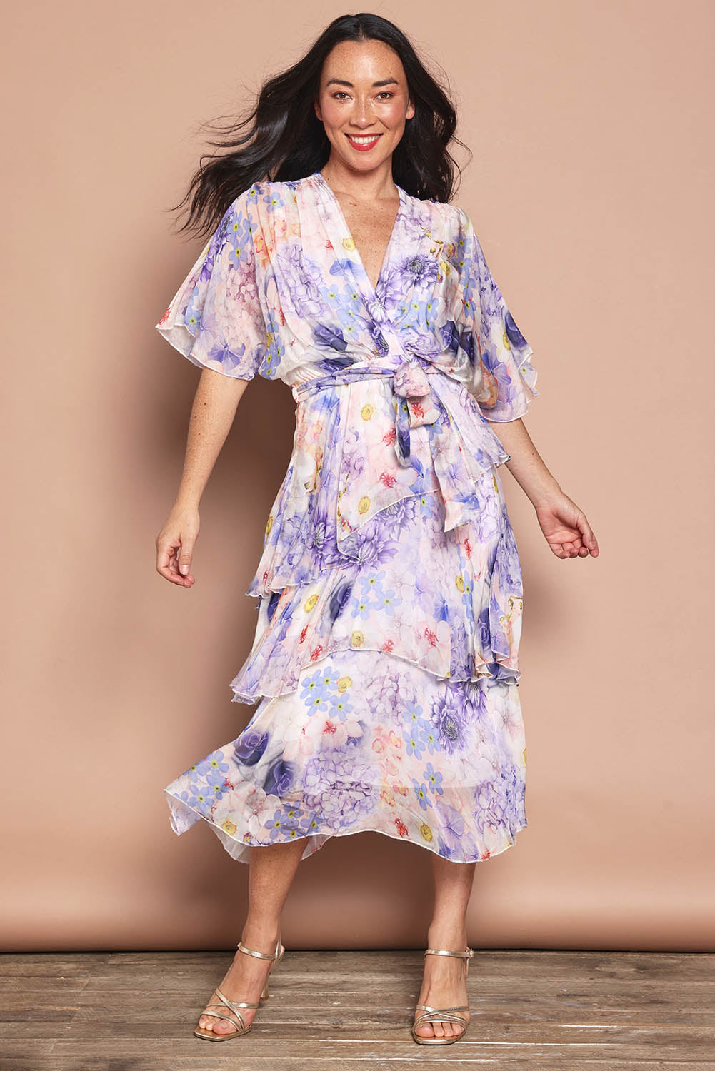 Model Katie wearing the Frill Sleeve Silk Blend Print Dress in colour Jacaranda (White), from the front, showing the whole outfit