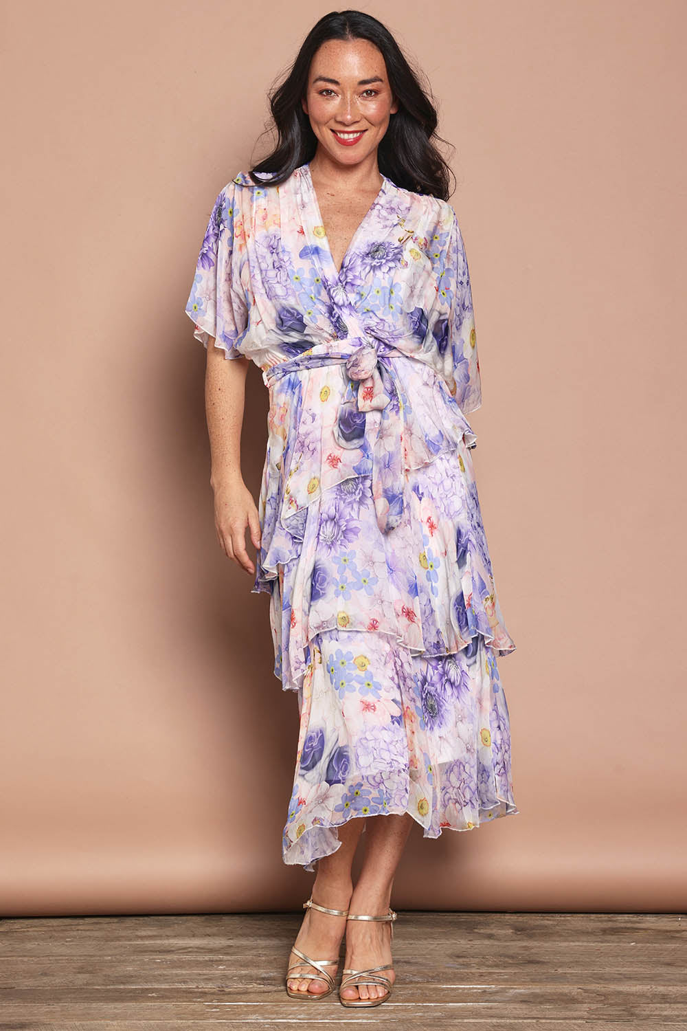 Model Katie wearing the Frill Sleeve Silk Blend Print Dress in colour Jacaranda (White), from the front, showing the whole outfit