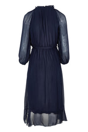 Product shot of the Long Sleeve Silk Frill Tied Neck Knee Length Dress in colour Navy (Blue), from the back