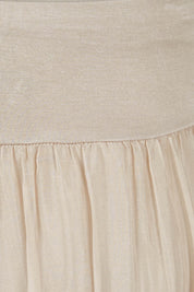 Product shot of the Silk Pant in colour Beige, detail
