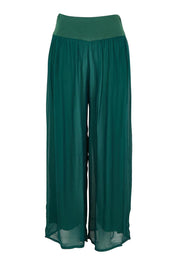 Product shot of the Silk Pant in colour Darkgreen (Green), from the front