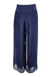 Product shot of the Silk Pant in colour Navy (Blue), from the back