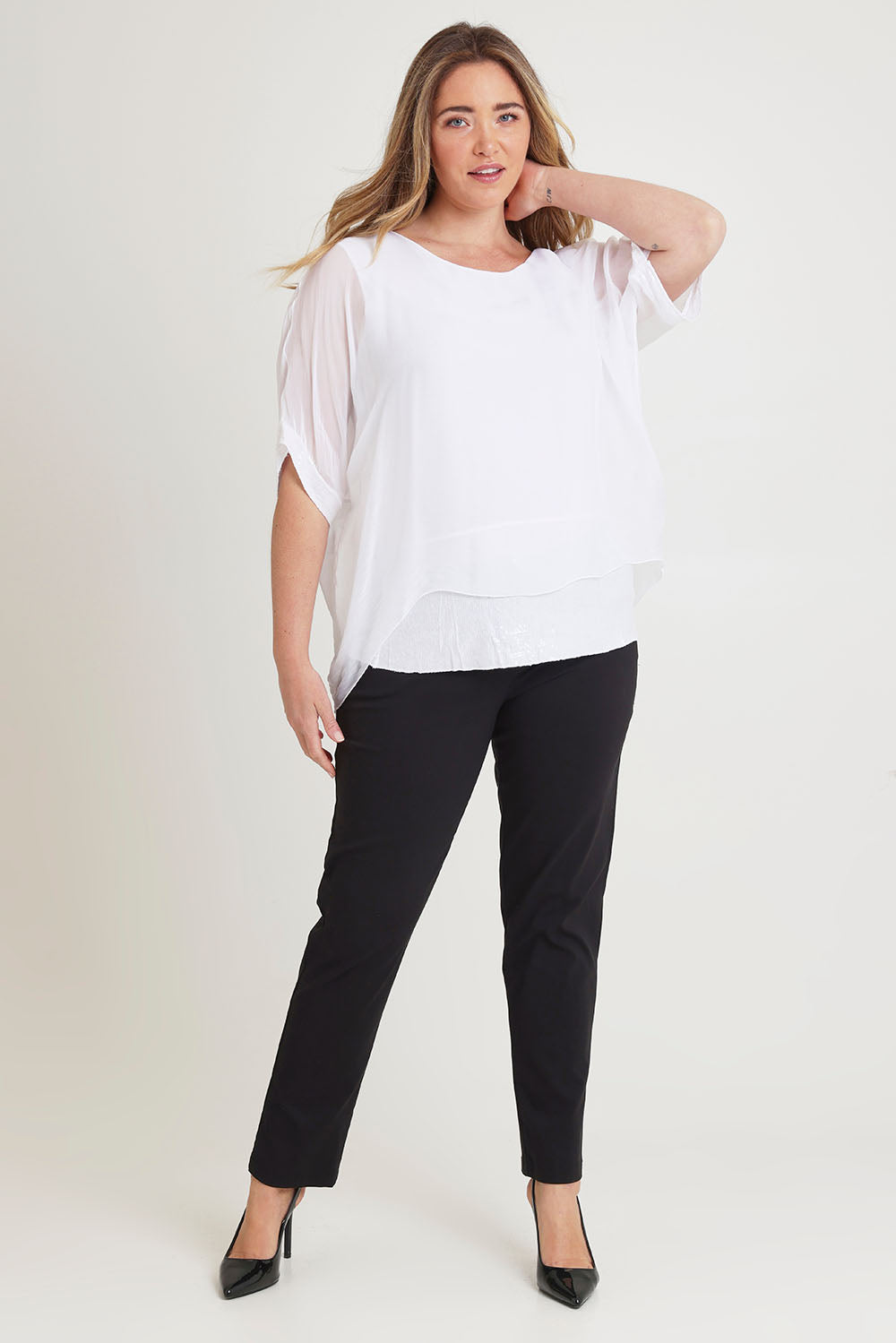 Model Chanel wearing the Silk Sequin Top in colour White (White), from the front, showing the whole outfit