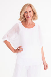 Model Sandy wearing the Silk Sequin Top in colour White (White), from the front, cropped image
