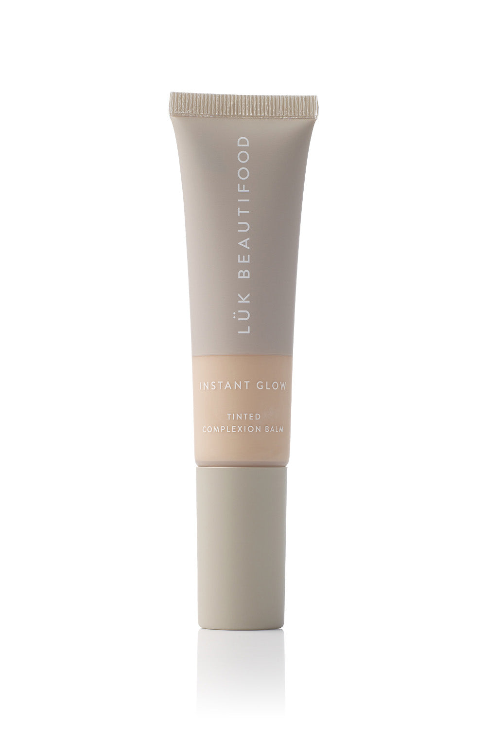 Product shot of the Tinted Complexion Balm in colour Light, detail