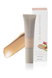 Product shot of the Tinted Complexion Balm in colour Light, from the front