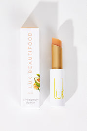 A model wearing size OneSize of the Pure Lip Nourish in colour Pure (Pink), from the front, showing the whole outfit