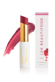 A model wearing the Rose Lip Nourish in colour Rose (Pink), from the front, showing the whole outfit