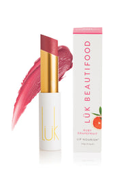A model wearing the Ruby Grapefruit Lip Nourish in colour Red (Red), from the front, showing the whole outfit