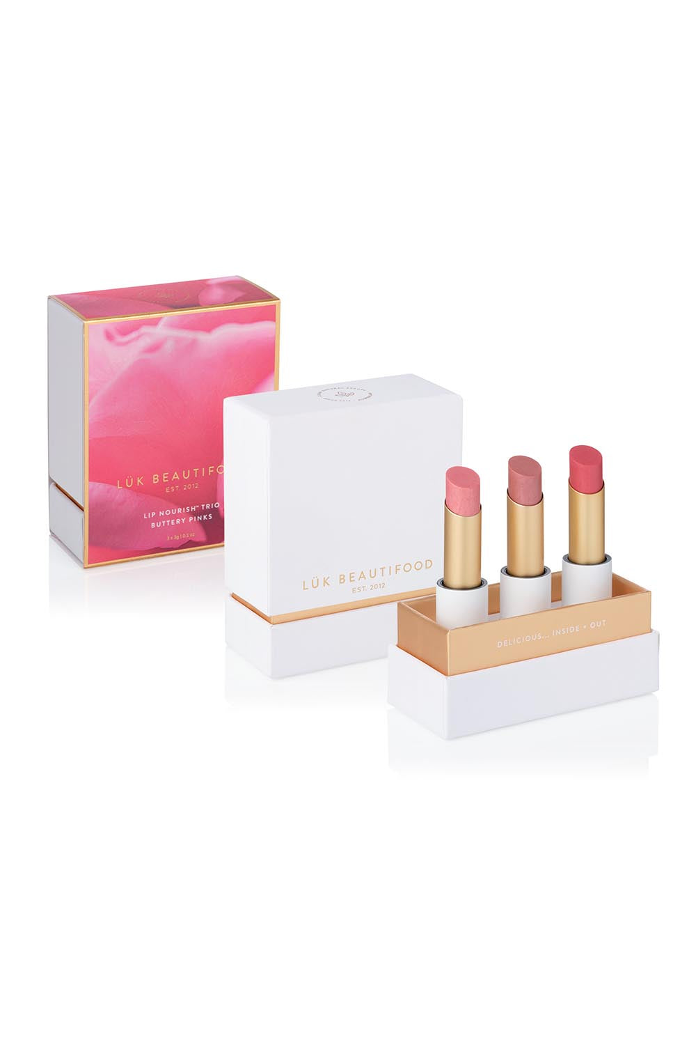 A model wearing the Lip Nourish Trio in colour Pinks (Pink), from the front, showing the whole outfit