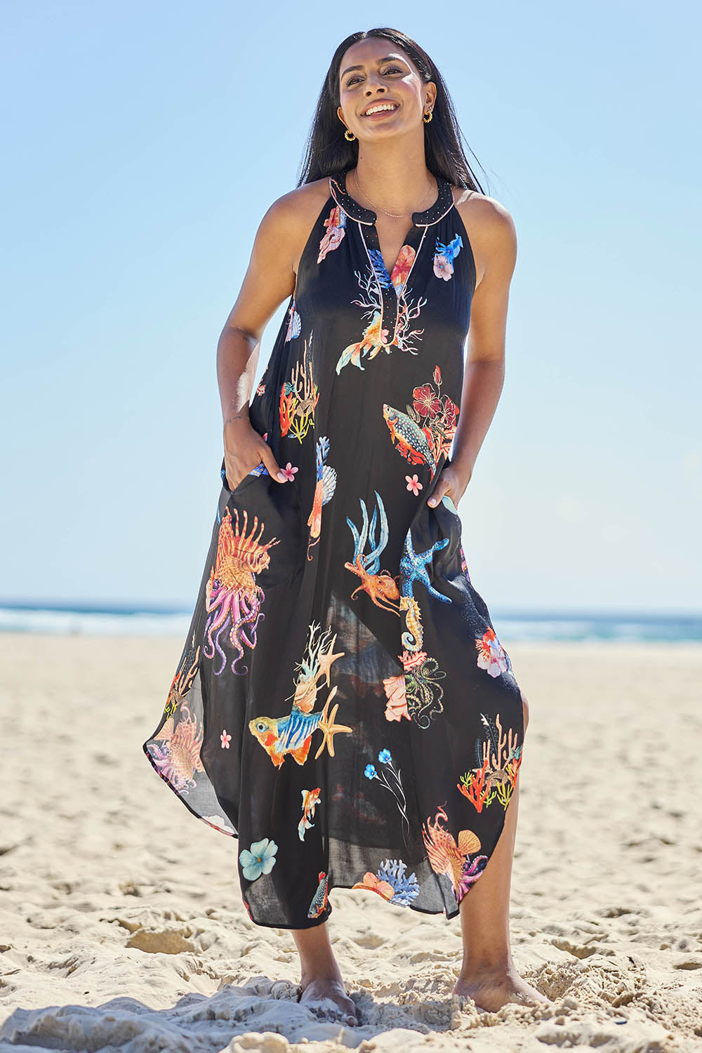 Model Eshan wearing size 10 of the Abyss Maxi Dress - Black in colour Black, from the front