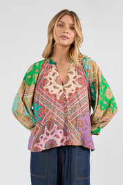 Model Genericm wearing size sample of the Algarve Top – Multi in colour Multi, in a cropped view