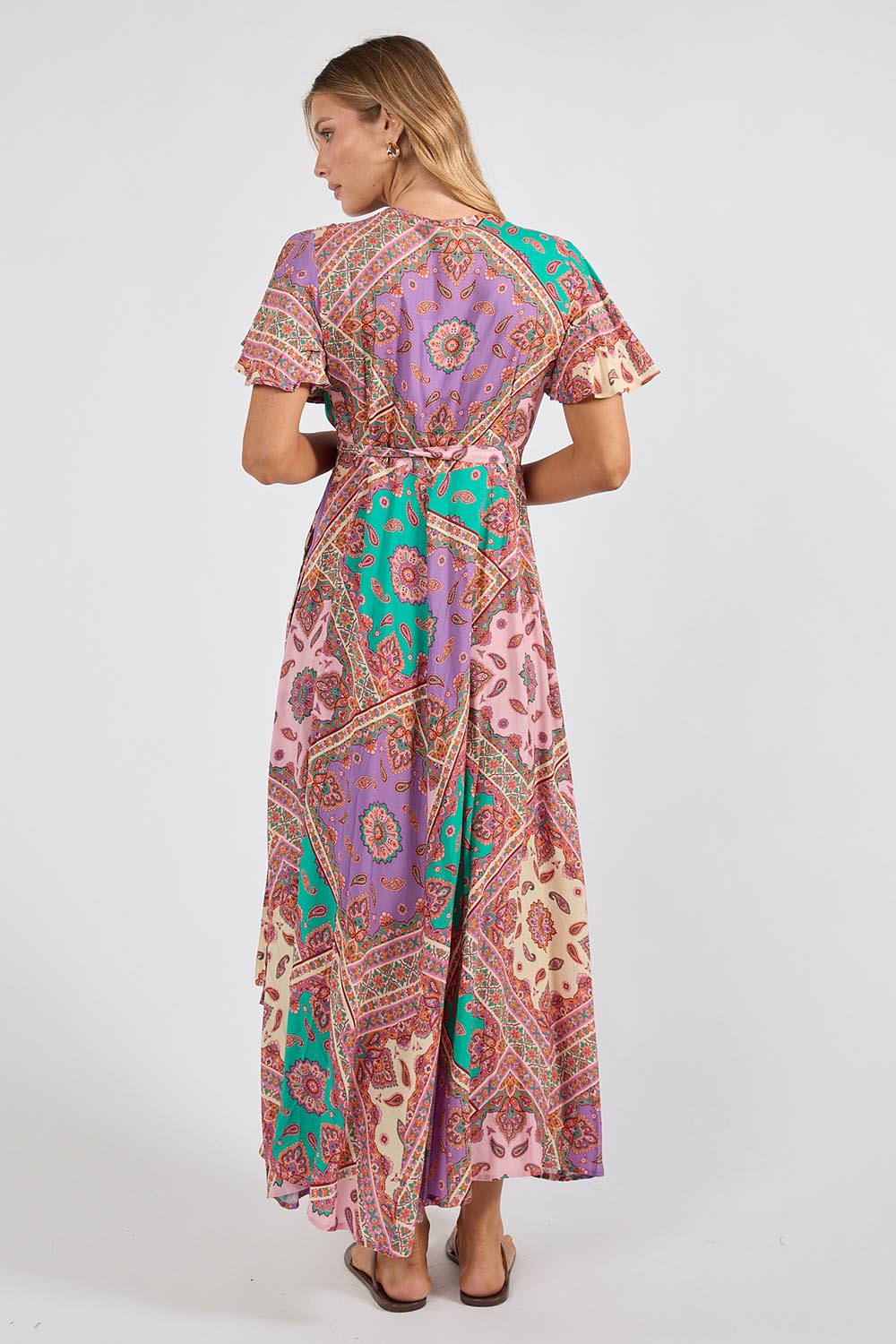 Model Genericm wearing size sample of the Algarve Wrap Dress – Violet in colour Violet, from the front