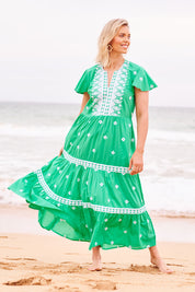 Model Phoebe wearing size S of the Antigua Maxi Cotton Dress in colour Sea (Green), from the front, showing the whole outfit