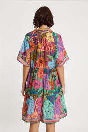 A model wearing the Auberge Modal Blend Dress in colour Multi, from the back