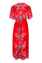 Product shot of the Bahia Midi Dress in colour Geranium, from the back
