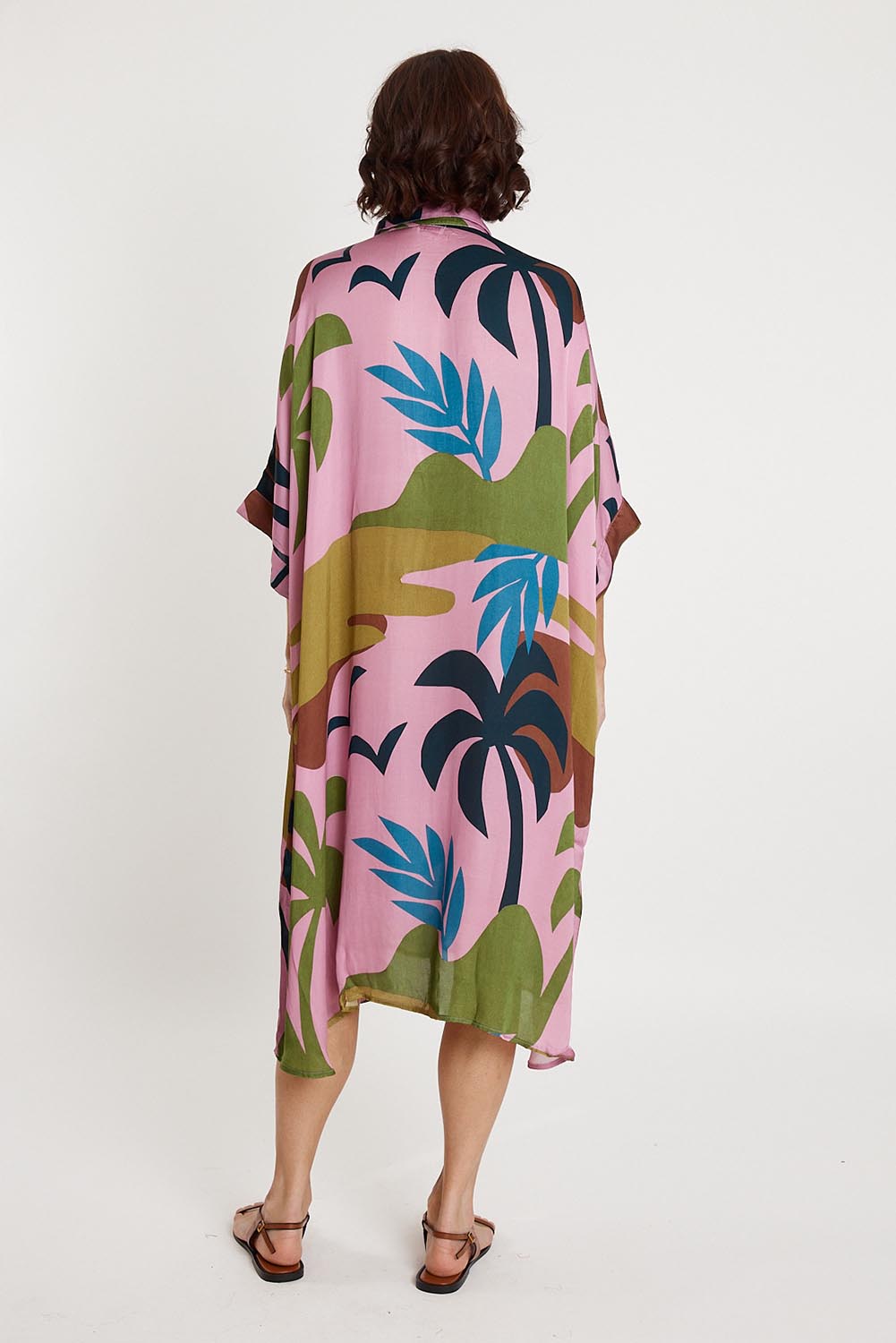 A model wearing the Banderas Modal Blend Kaftan in colour Lilac (Purple), from the back