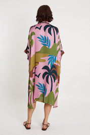 A model wearing the Banderas Modal Blend Kaftan in colour Lilac (Purple), from the back