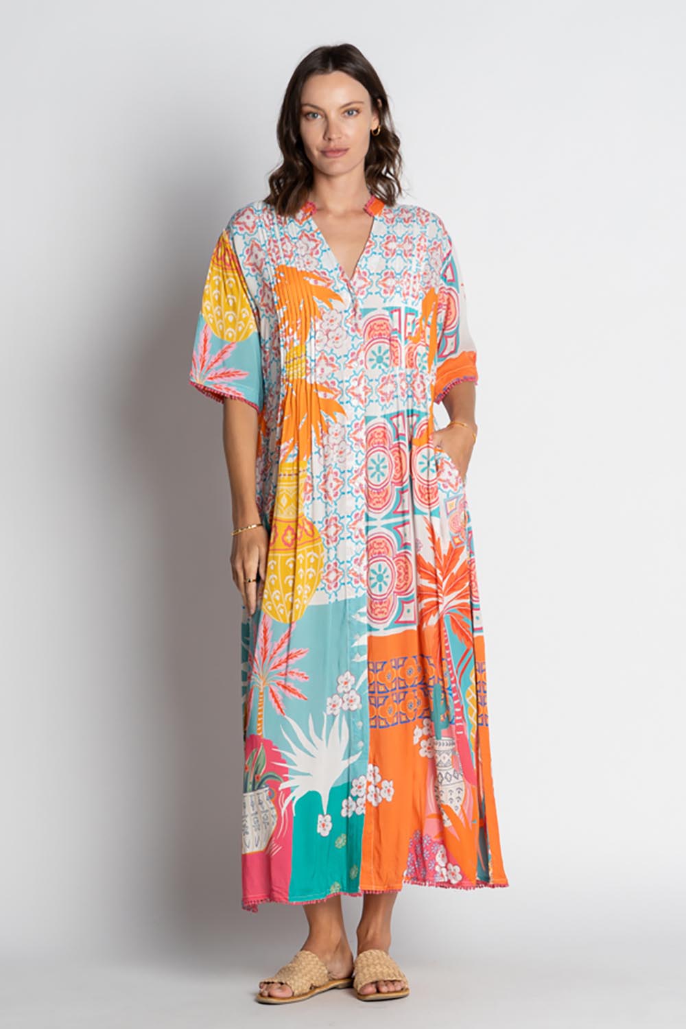 A model wearing the Busena Midi Dress in colour Mist, from the front, showing the whole outfit