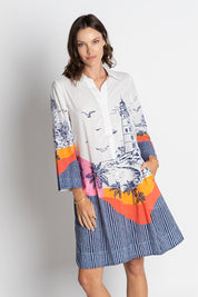 A model wearing the Byron Cotton Shirtmaker Dress in colour Print, from the front, cropped image