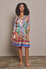 Model Ziara wearing size S of the Carlisle Dress in colour Print, from the front, showing the whole outfit