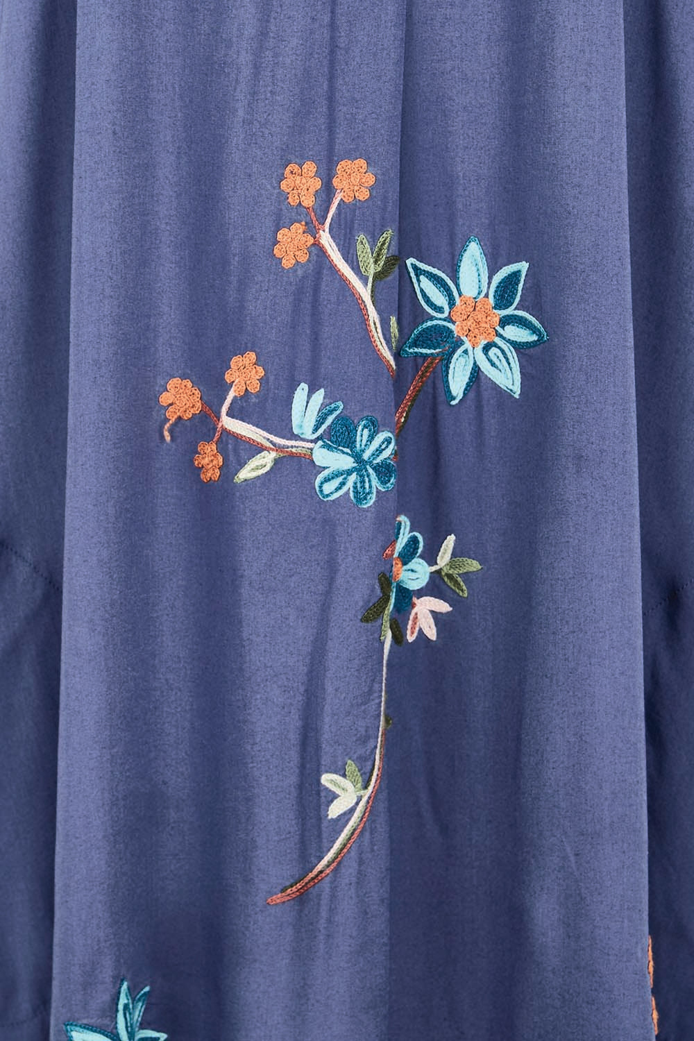 Product shot of the Casita Kaftan Dress – Navy in colour Navy, showing detail