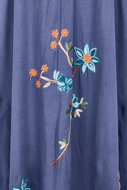 Product shot of the Casita Kaftan Dress – Navy in colour Navy, showing detail