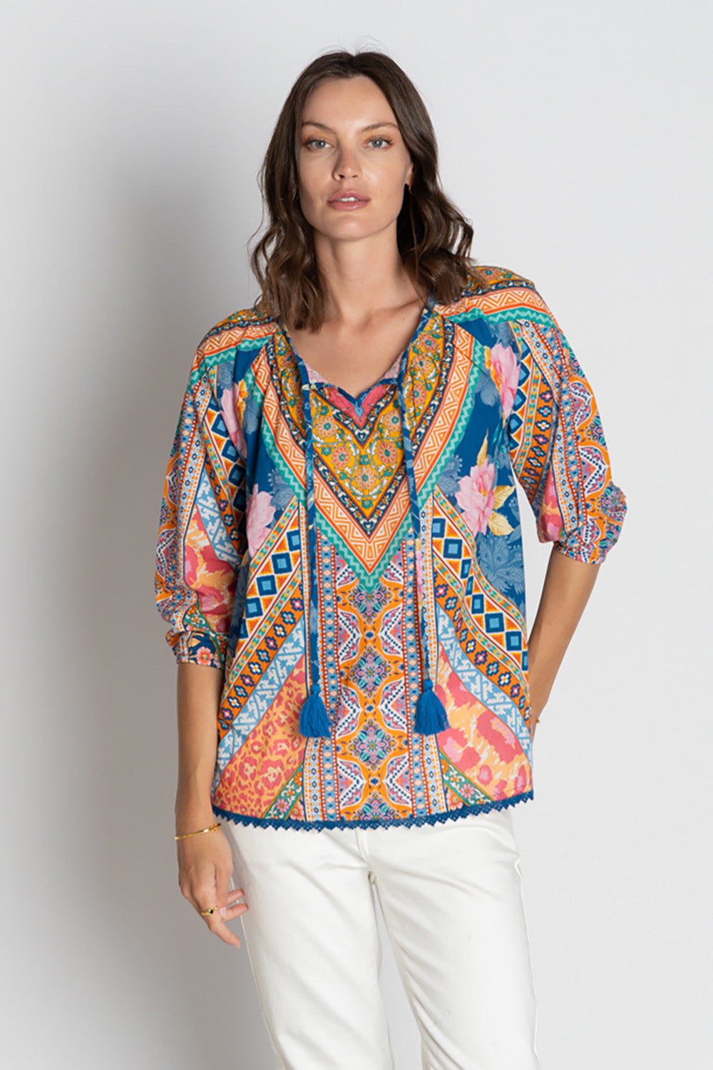 A model wearing the Danai Cotton Top in colour Ocean, from the front, cropped image