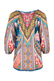 Product shot of the Danai Cotton Top in colour Ocean, from the back