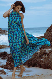 A model wearing the Ethel Midi in colour Navy (Blue), from the front, showing the whole outfit