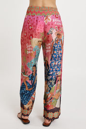 A model wearing the Fiesta Modal Blend Pant in colour Print, from the back